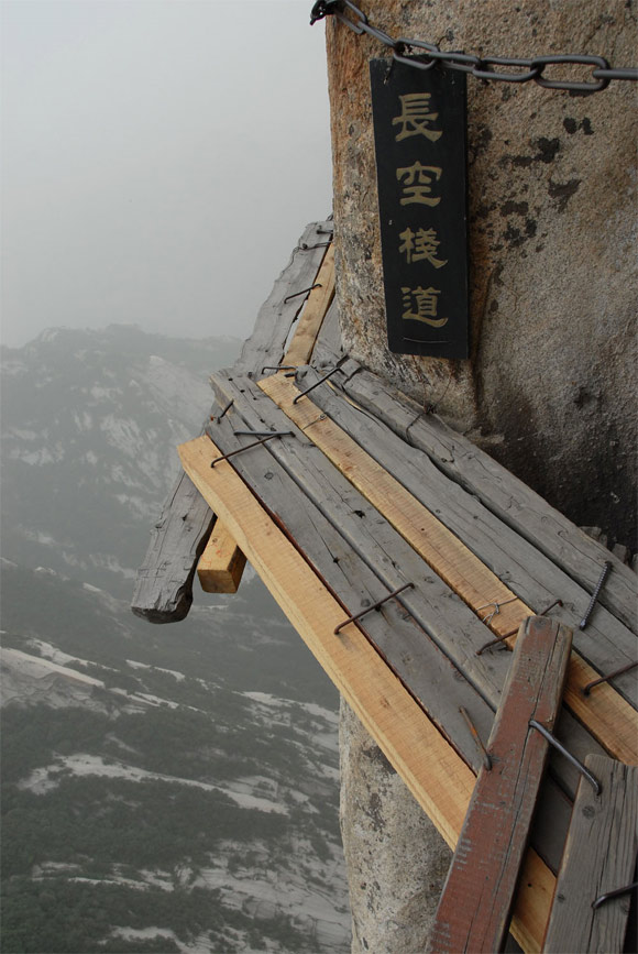 wooden bridge The Spectacular Heights Of The Yellow Mountains In China